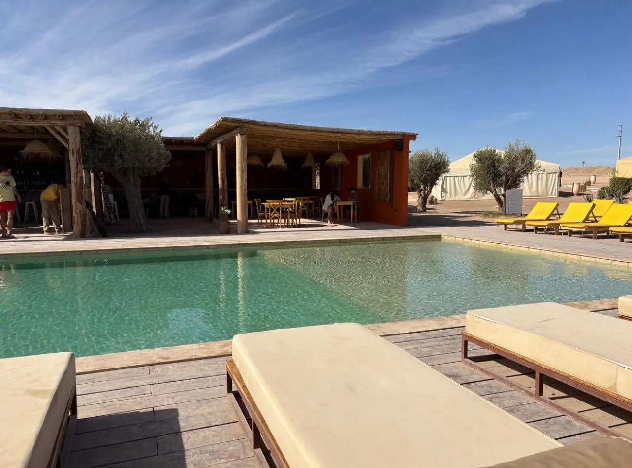 A peaceful Marrakech terrace framed by an arch, prepared for a private Moroccan journey